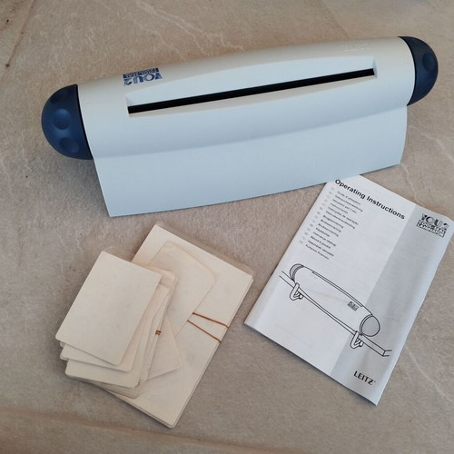 Laminating machine used for office or home with plastic sheets