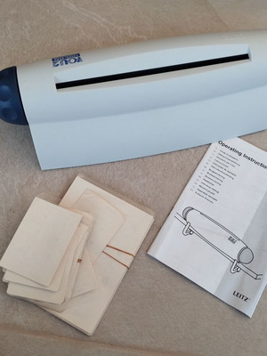 Laminating machine used for office or home with plastic sheets