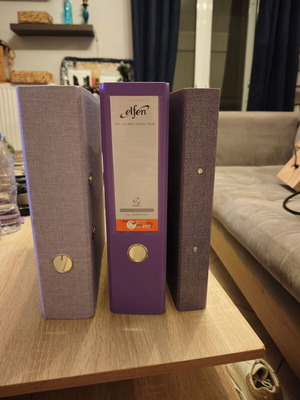 Set of three A4 filing binders in purple shades like new