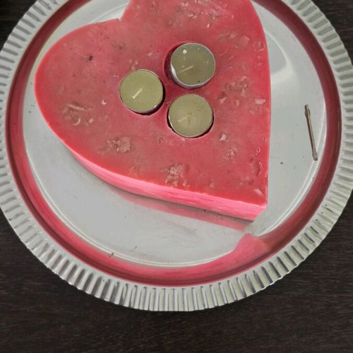 Decorative heart-shaped candle like new