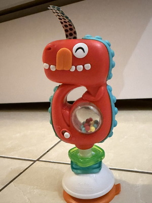 Dinosaur toy like new with suction cup and sound