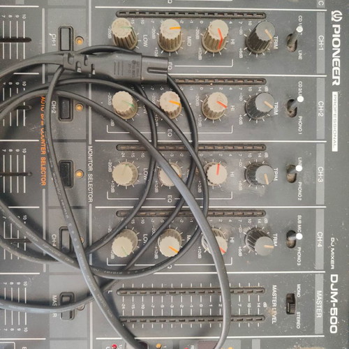 Pioneer DJM-500 mixer and Pioneer EFX500 silver effect processor used