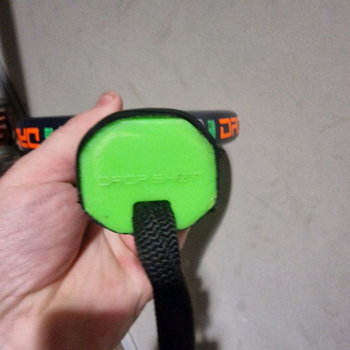 Padel racket used, moderate condition with small cracks