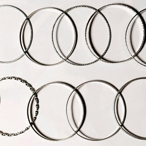 Set of 10 women's bracelets stainless steel new in gift box