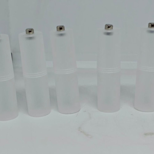 Battery adapters AA to C set of 8, like new, plastic transparent