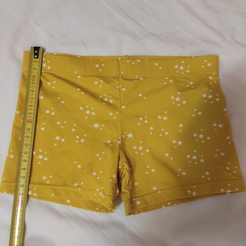 Gocco kids' swimsuit like new, white stars on light mustard, size 5-6 years