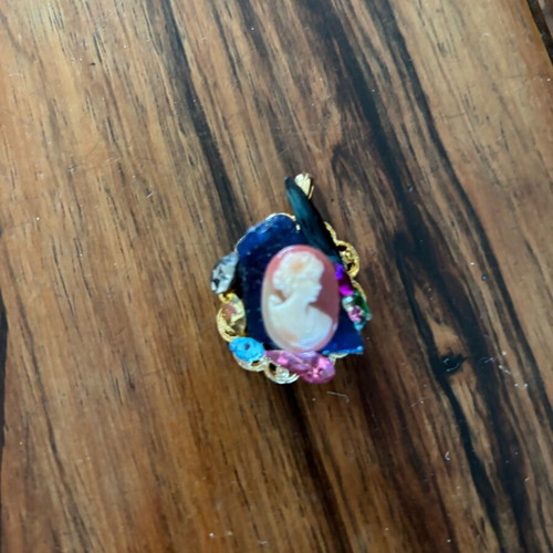 Handmade pendant used with stones and colorful crystals