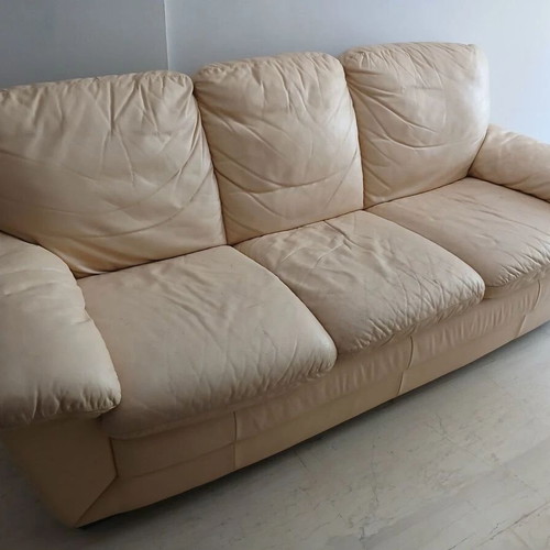 Leather three-seater sofa, beige