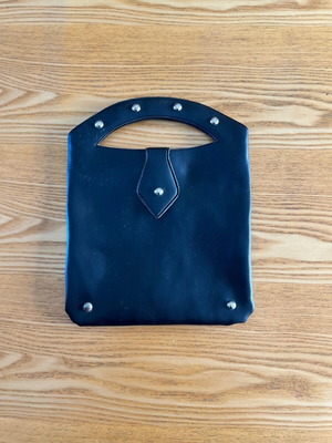 Y2K black handbag with metal studs, vintage style