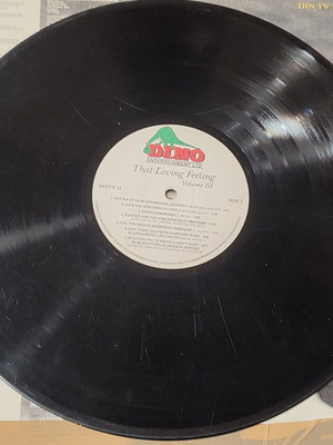 That Loving Feeling vinyl record used with scratches