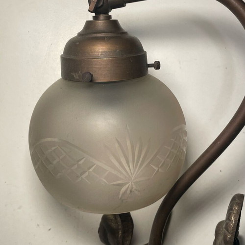 Bronze wall light like new with carved white glass and angel shape