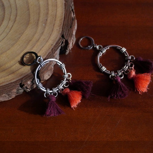 Handmade hanging earrings new with pink and purple tassels