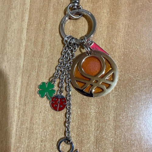 United Colors of Benetton silver keychain like new