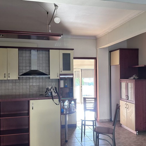 Kitchen cabinets, brown and cream, used