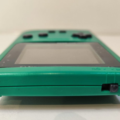 Game Boy Pocket Green console used with Test Drive 6 game