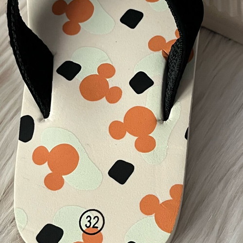 Disney Mickey Mouse flip flops new, size 32