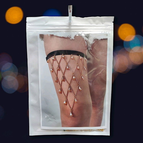 Garter new with gold chains and large crystals
