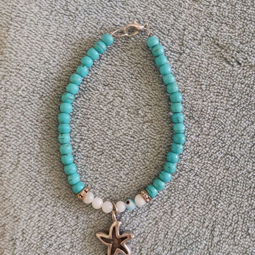 Bracelet with turquoise and white beads, silver details, new