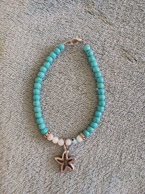 Bracelet with turquoise and white beads, silver details, new