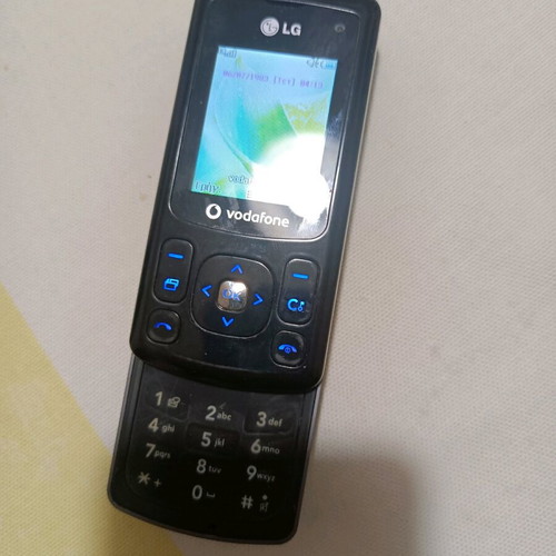 LG cell phone used, 3G, with keypad and dual cameras