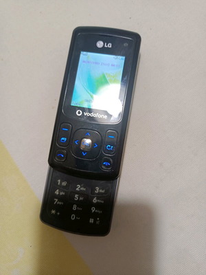 LG cell phone used, 3G, with keypad and dual cameras