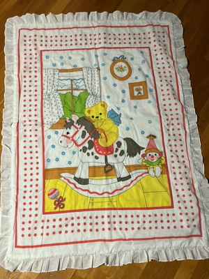 Children's quilt like new with retro designs and red dots