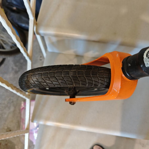 Lionelo Bart Air balance bike used, black orange
