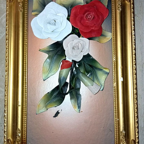 Framed artwork with gold frame and handmade clay roses