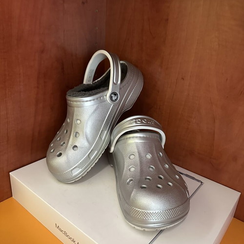 Crocs silver shoes worn but in excellent condition
