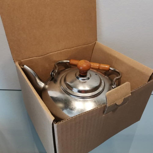 Teapot used with wooden handle and meander pattern