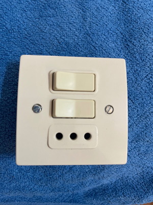 Double switch with socket white bakelite, new, Greek made