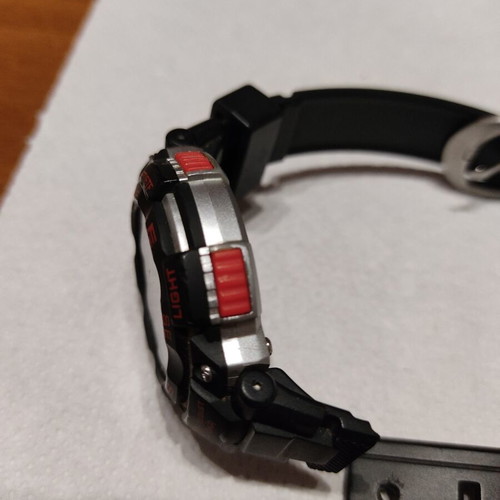 Q&Q wristwatch used with new battery and broken strap, black