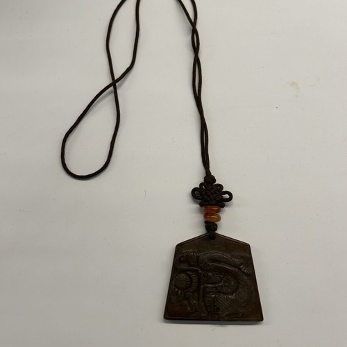Pendant necklace with carved brown jade dragon, like new