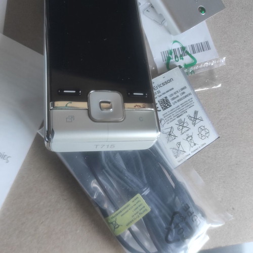 Sony Ericsson T715 box with original accessories and non-working device used