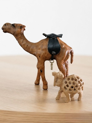 Decorative camel figurines like new, leather and wood, set of two