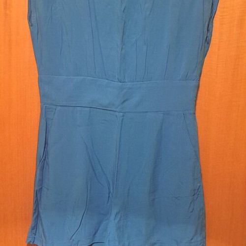 One-piece suit used, blue color, size M