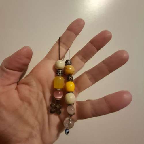 Worry beads used with colorful beads, evil eye and metal element