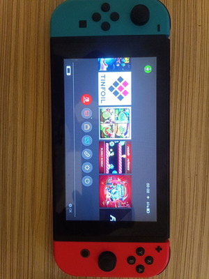 Nintendo Switch console used with 128GB Samsung memory card and dock