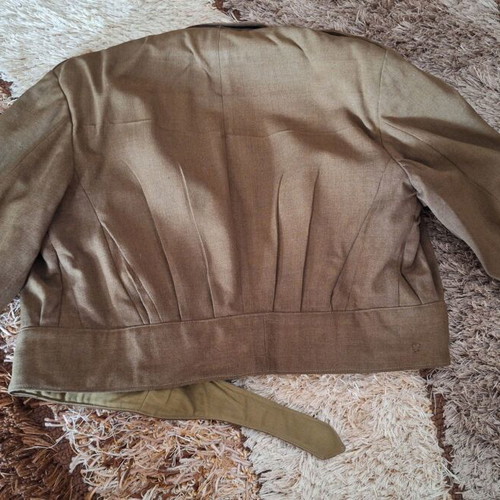 Vintage military jacket used with minor wear