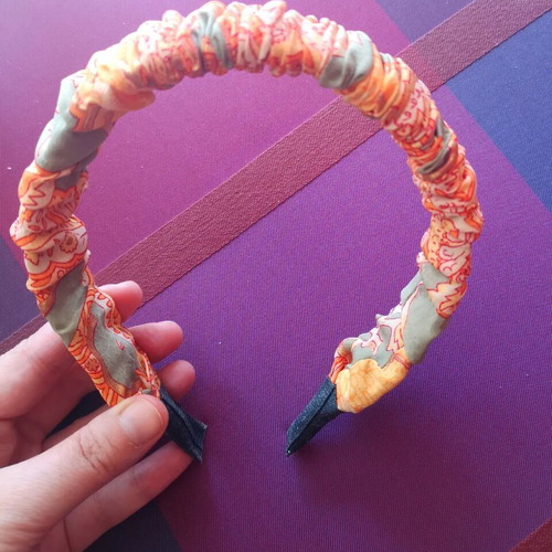 Orange headband with paisley pattern new