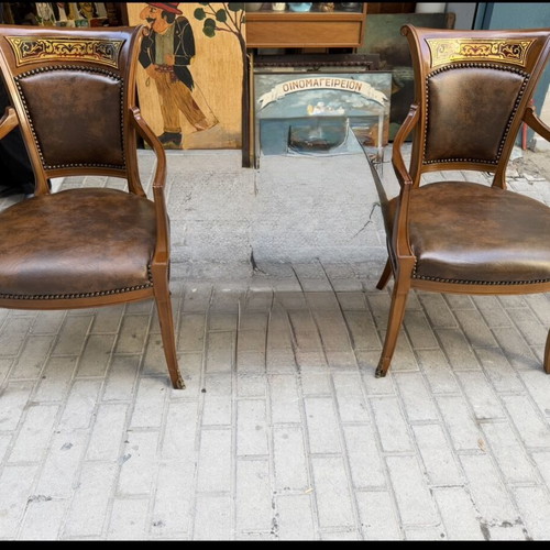 Pair of walnut wood armchairs with leather and backrest finish