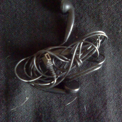 Motorola WX181 like new mobile phone with charger, headphones, and box