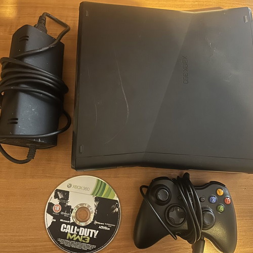 Xbox 360 Slim used with 250GB hard drive and one game