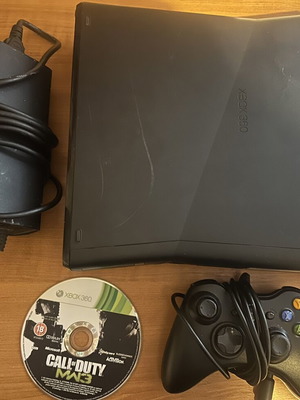 Xbox 360 Slim used with 250GB hard drive and one game