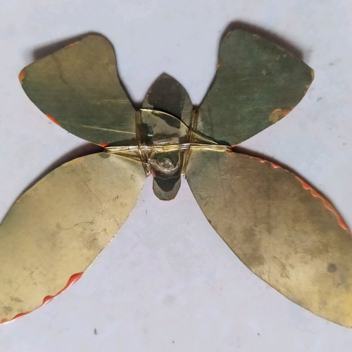 Metal handmade butterfly and metal pomegranate box used