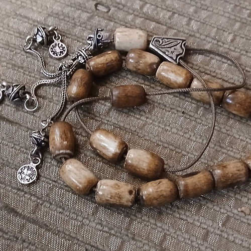 Worry beads made of bone used with oriental elements