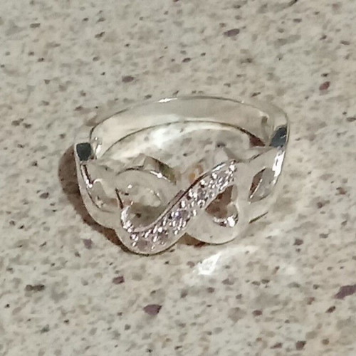 Zircon ring new, silver color, size 6.50