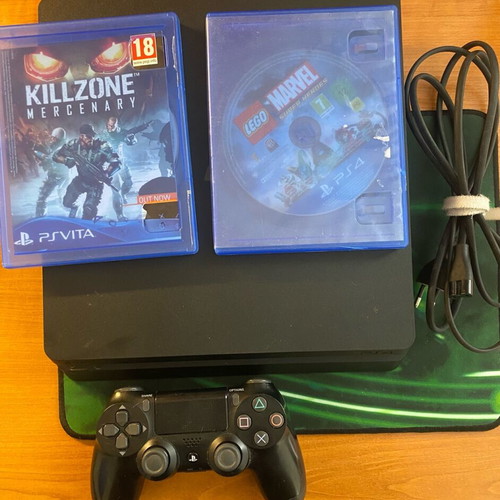 PlayStation 4 slim used with 2 games