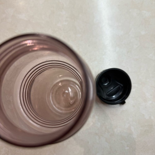Plastic thermos used, spacious, with broken lid