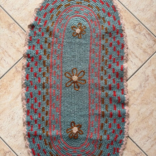 Handmade knitted rug used